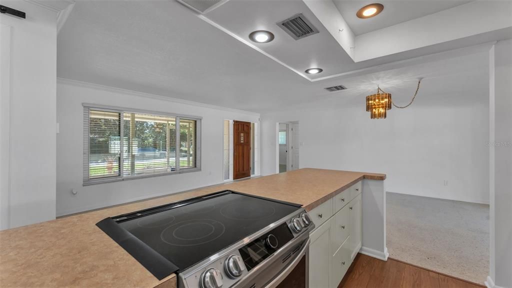Chandelier, Interior, Kitchen, Recessed Lighting, Stainless Steel Appliances, Wood Texture Flooring