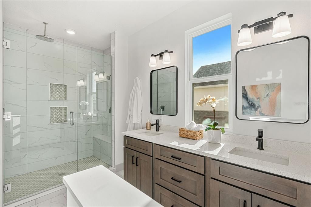 Bathroom, Dual Sink Vanities, Glass Shower, Interior, Marble Walls, Recessed Lighting