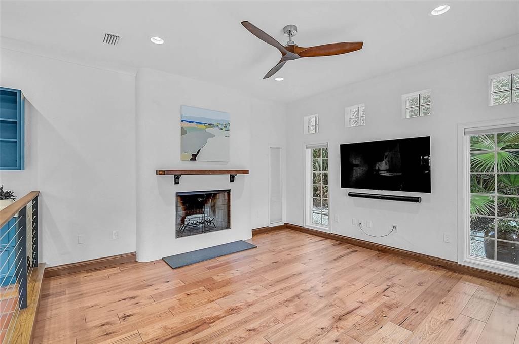 Empty room, Fireplace, Interior, Recessed Lighting, Wood Texture Flooring