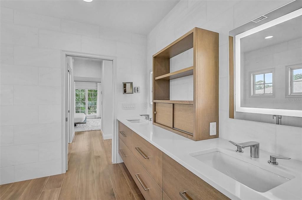 Bathroom, Dual Sink Vanities, Interior, Recessed Lighting, Wood Texture Flooring