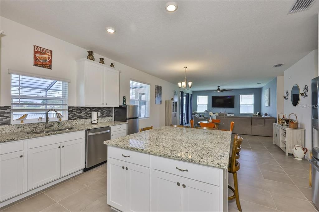 Chandelier, Dining room, Interior, Kitchen, Recessed Lighting, Stainless Steel Appliances