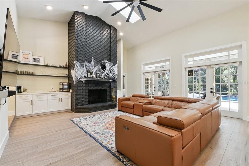 Fireplace, Interior, Living room, Recessed Lighting, Wood Texture Flooring