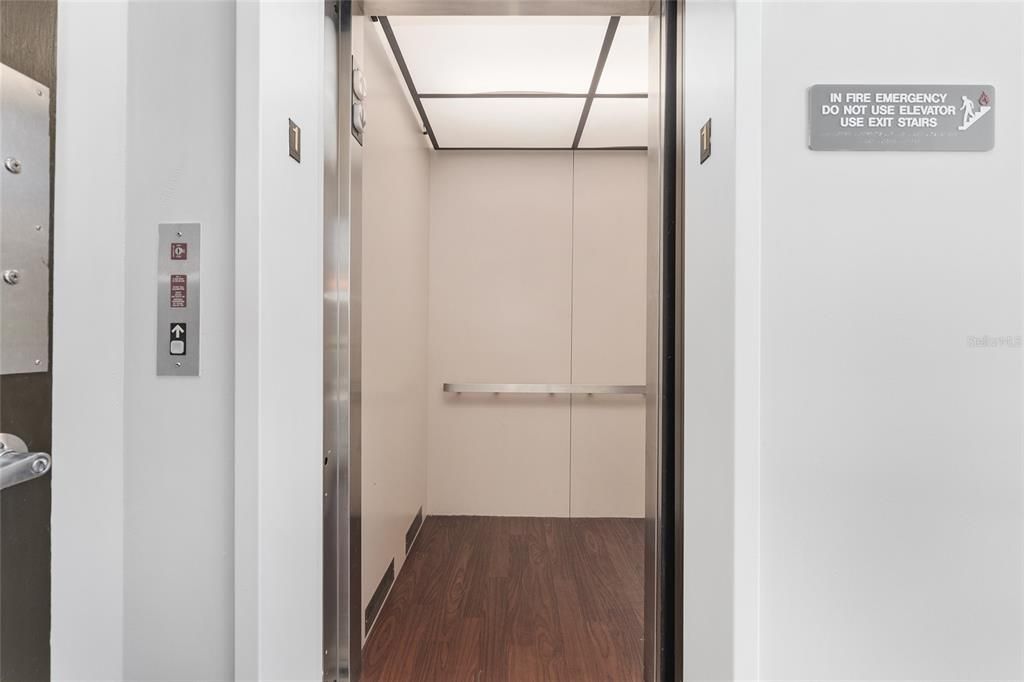 Elevator, Interior, Wood Texture Flooring