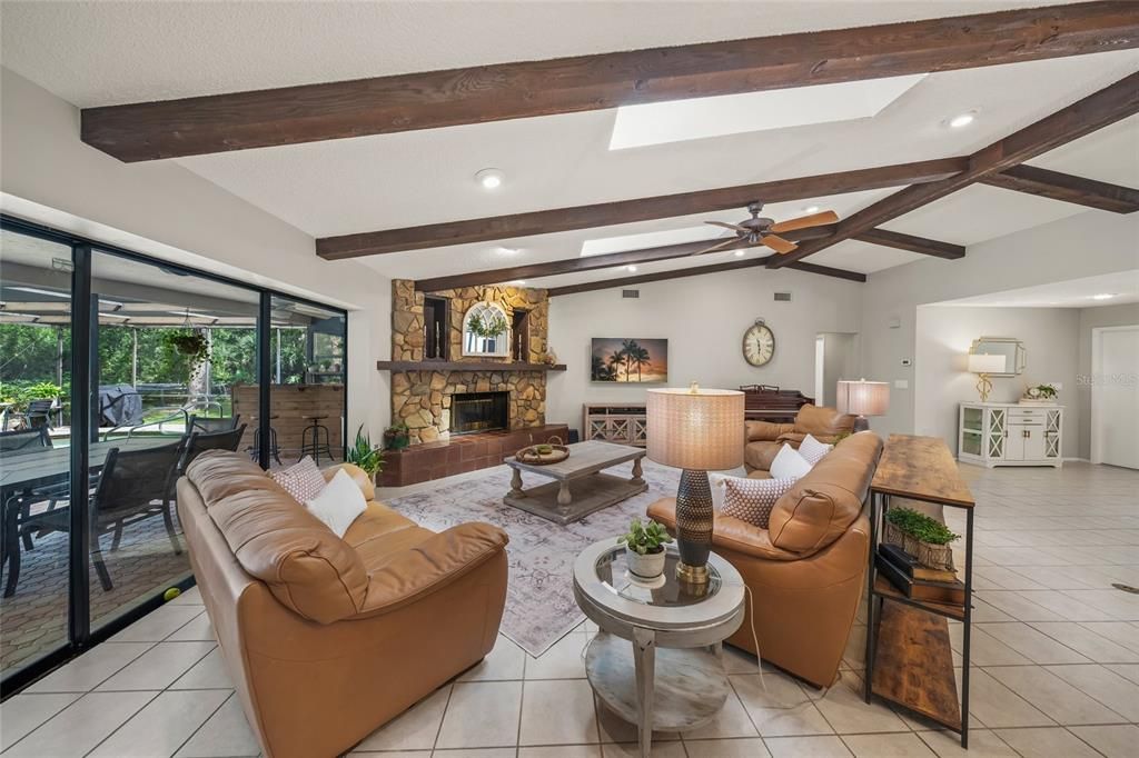 Dining room, Fireplace, Interior, Living room, Recessed Lighting, Wooden Beams