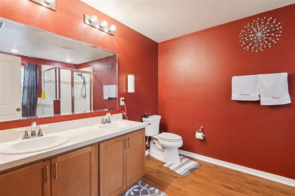 Bathroom, Dual Sink Vanities, Glass Shower, Interior, Wood Texture Flooring