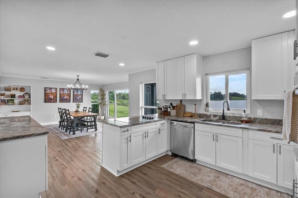 Chandelier, Dining room, Interior, Kitchen, Pendant Lights, Recessed Lighting, Wood Texture Flooring
