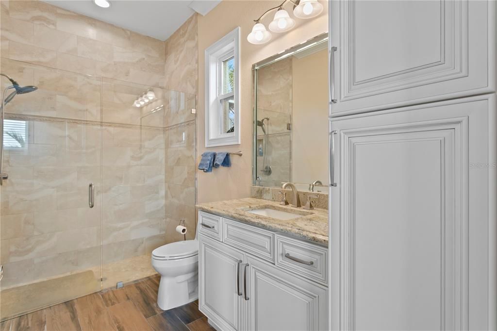 Bathroom, Glass Shower, Interior, Recessed Lighting, Wood Texture Flooring