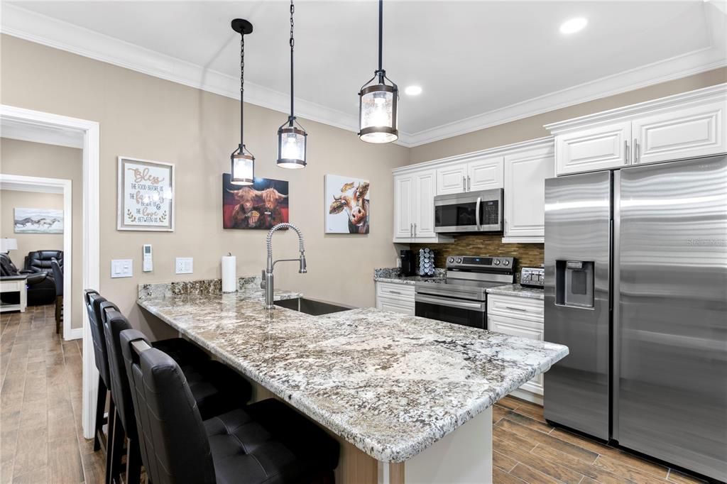 Interior, Kitchen, Pendant Lights, Recessed Lighting, Stainless Steel Appliances, Wood Texture Flooring