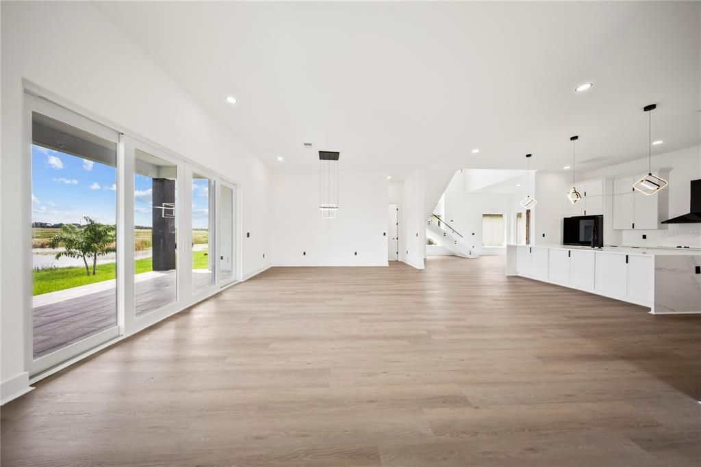 Empty room, Interior, Kitchen, Pendant Lights, Recessed Lighting, Wood Texture Flooring