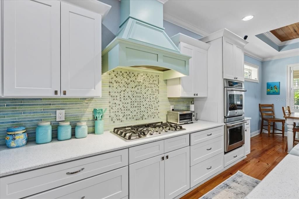 Dining room, Interior, Kitchen, Recessed Lighting, Stainless Steel Appliances, Wood Texture Flooring
