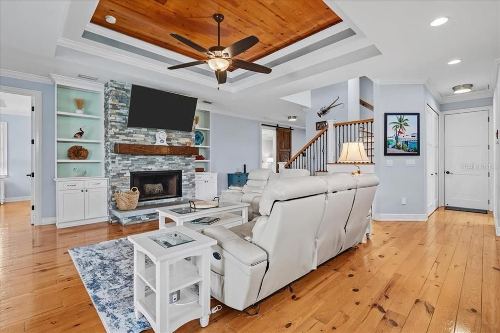 Fireplace, Interior, Living room, Recessed Lighting, Stone Walls, Wooden Ceilings, Wood Texture Flooring