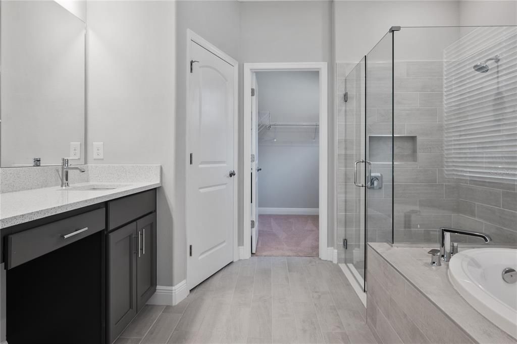 Bathroom, Dual Sink Vanities, Glass Shower, Interior, Wood Texture Flooring