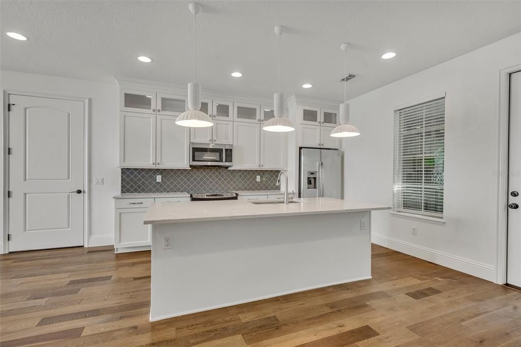 Interior, Kitchen, Pendant Lights, Recessed Lighting, Stainless Steel Appliances, Wood Texture Flooring