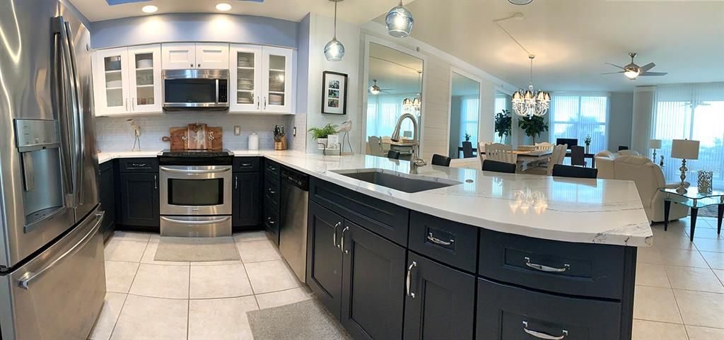 Chandelier, Dining room, Interior, Kitchen, Pendant Lights, Recessed Lighting, Stainless Steel Appliances