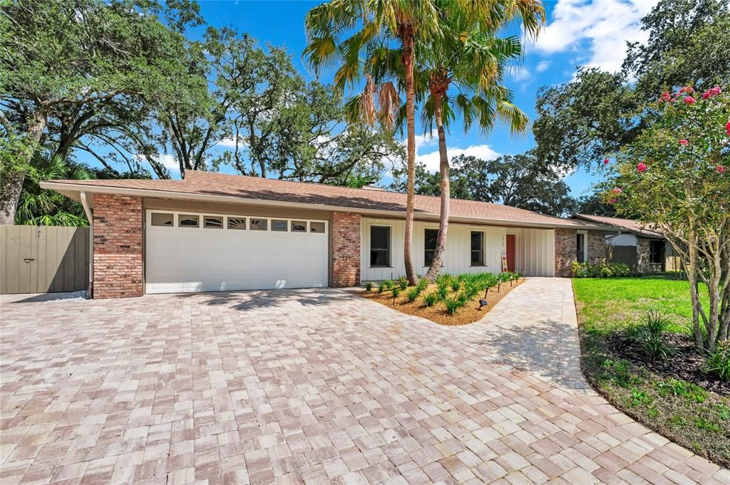 Attached, Backyard, Exterior, Facade, Brick Facade, Ranch