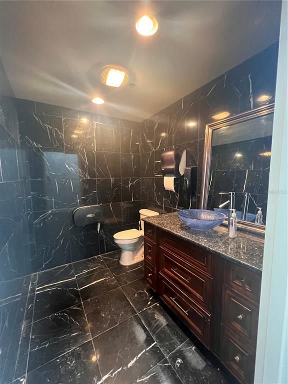 Bathroom, Dual Sink Vanities, Interior, Marble Walls, Recessed Lighting