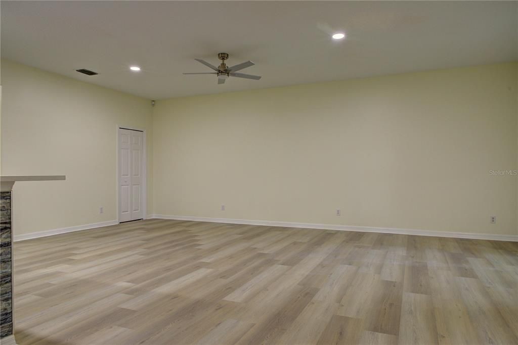 Empty room, Fireplace, Interior, Recessed Lighting, Wood Texture Flooring
