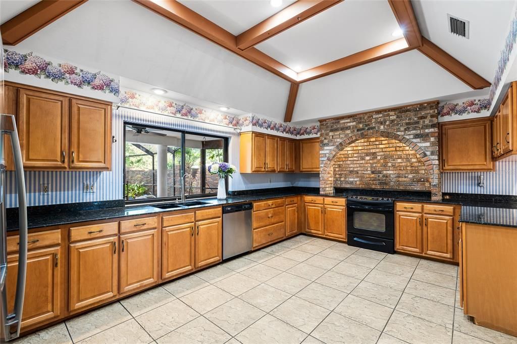 Interior, Kitchen, Recessed Lighting, Stainless Steel Appliances, Stone Walls, Wooden Beams