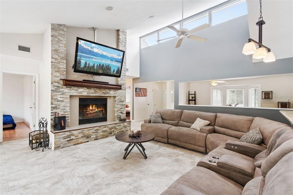 Fireplace, Interior, Living room, Pendant Lights, Stone Walls, Wood Texture Flooring
