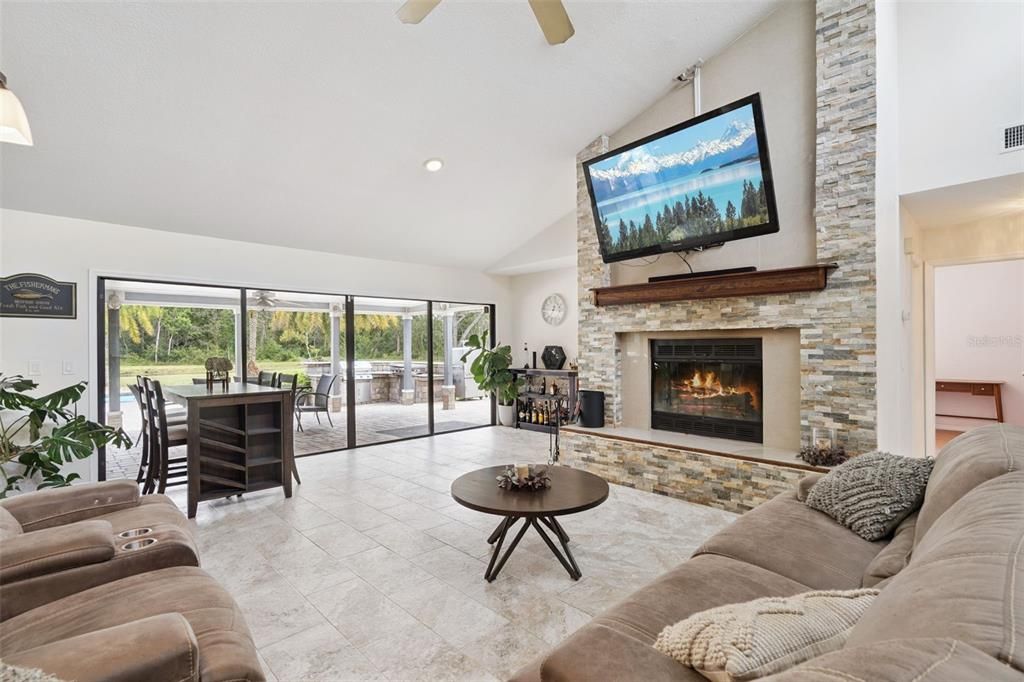 Dining room, Fireplace, Interior, Living room, Recessed Lighting, Stone Walls