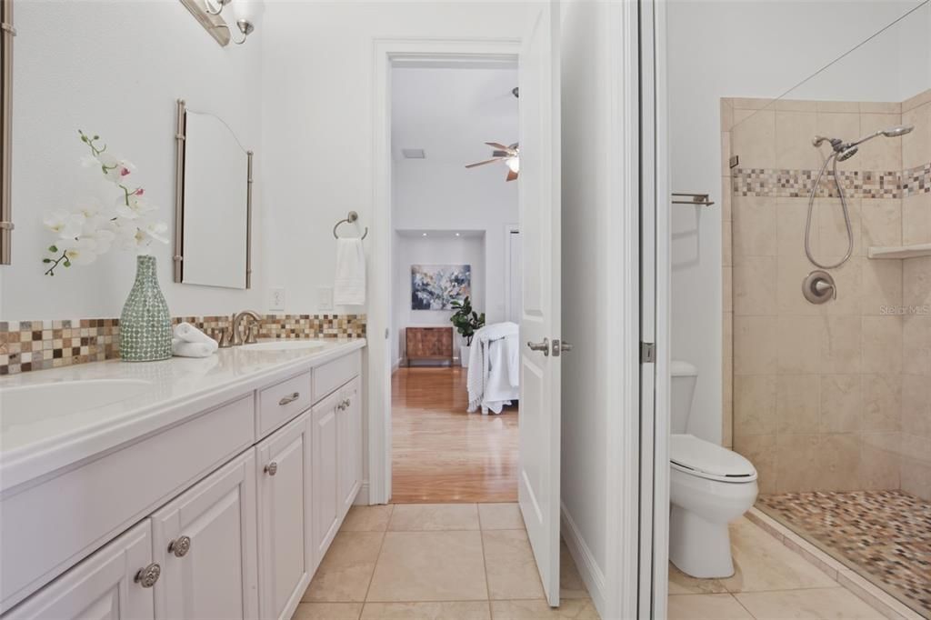 Bathroom, Dual Sink Vanities, Glass Shower, Interior, Wood Texture Flooring