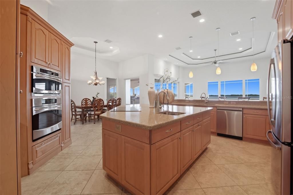 Chandelier, Dining room, Interior, Kitchen, Pendant Lights, Recessed Lighting, Stainless Steel Appliances
