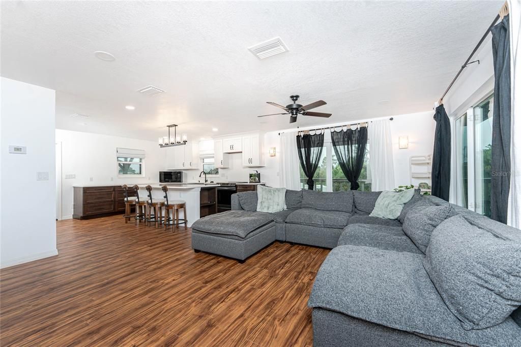 Dining room, Interior, Kitchen, Living room, Pendant Lights, Recessed Lighting, Wood Texture Flooring