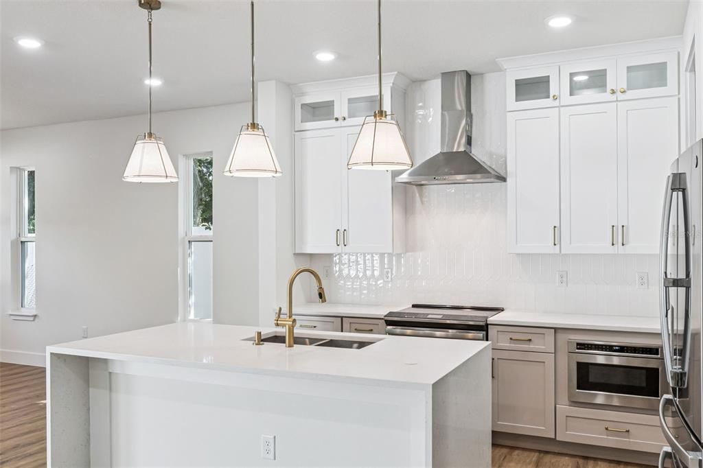 Interior, Kitchen, Pendant Lights, Recessed Lighting, Stainless Steel Appliances, Wood Texture Flooring