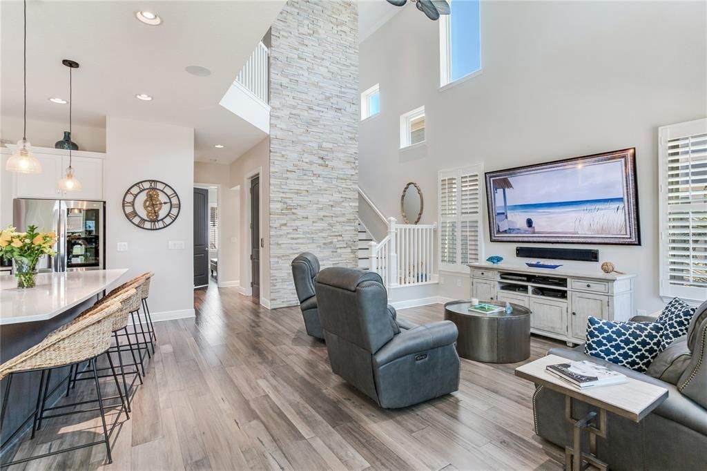 Interior, Living room, Pendant Lights, Recessed Lighting, Stone Walls, Wood Texture Flooring