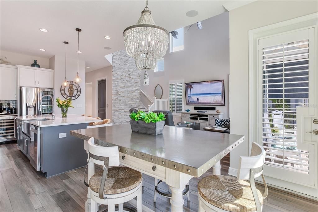 Chandelier, Interior, Kitchen, Pendant Lights, Recessed Lighting, Stainless Steel Appliances, Wood Texture Flooring