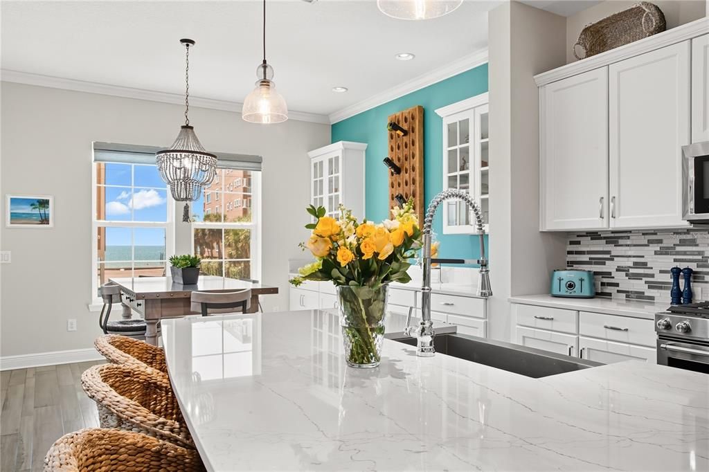 Dining room, Interior, Kitchen, Pendant Lights, Recessed Lighting, Stainless Steel Appliances, Water, Wood Texture Flooring