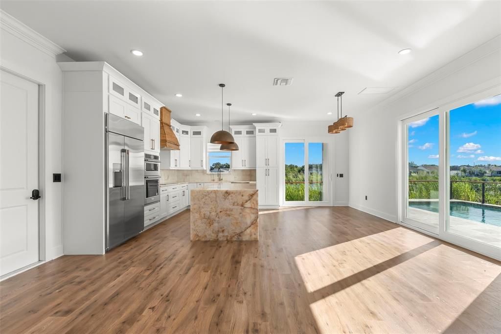 Interior, Kitchen, Pendant Lights, Recessed Lighting, Stainless Steel Appliances, Wood Texture Flooring