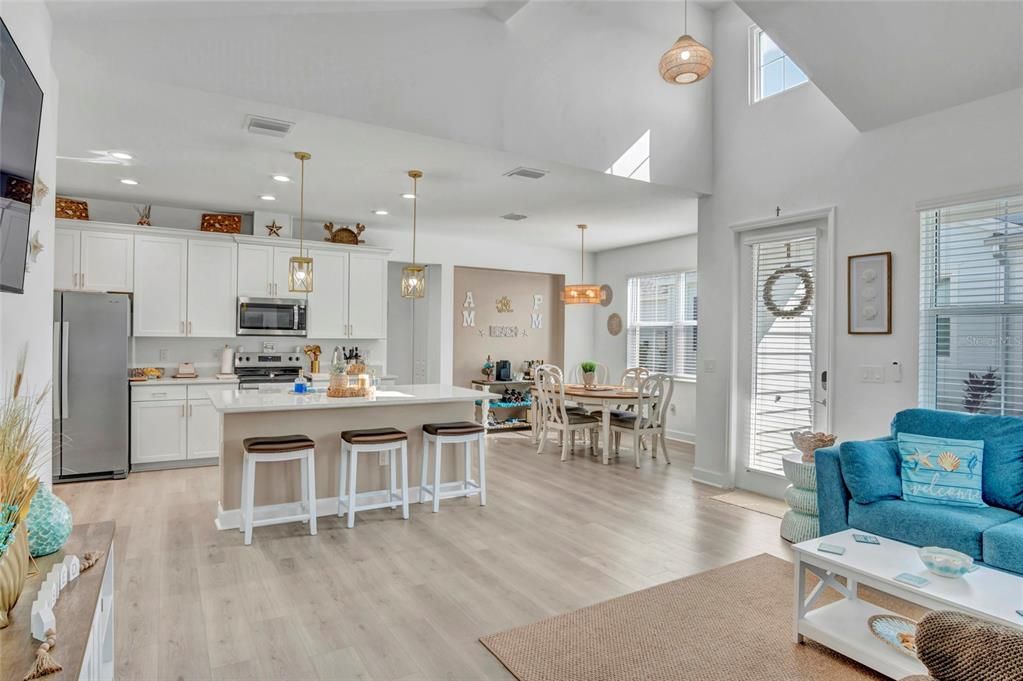 Dining room, Interior, Kitchen, Pendant Lights, Recessed Lighting, Stainless Steel Appliances, Wood Texture Flooring