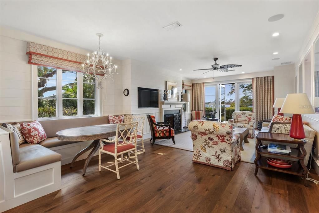 Chandelier, Dining room, Fireplace, Interior, Living room, Recessed Lighting, Wood Texture Flooring