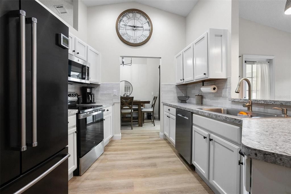 Dining room, Interior, Kitchen, Stainless Steel Appliances, Wood Texture Flooring