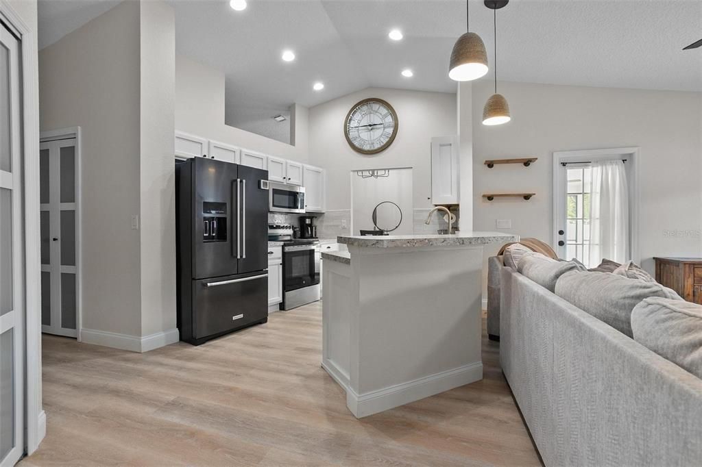 Interior, Kitchen, Pendant Lights, Recessed Lighting, Stainless Steel Appliances, Wood Texture Flooring