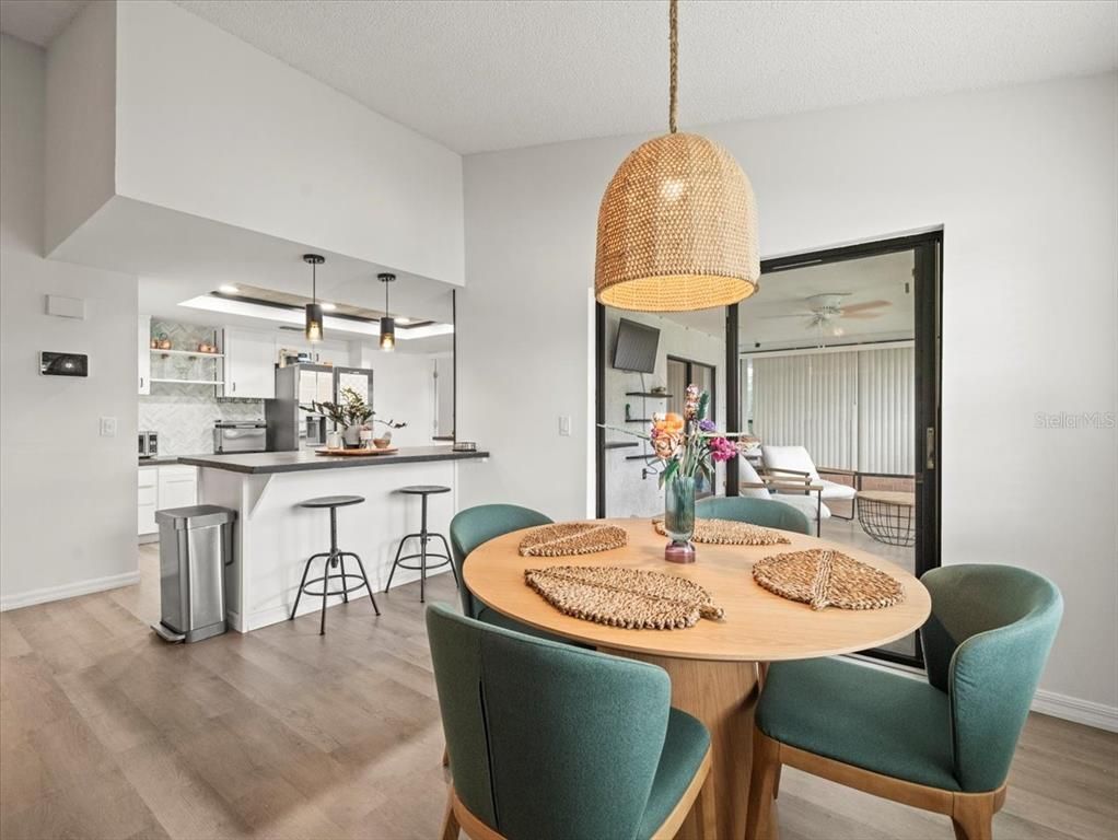 Dining room, Interior, Kitchen, Pendant Lights, Stainless Steel Appliances, Wood Texture Flooring