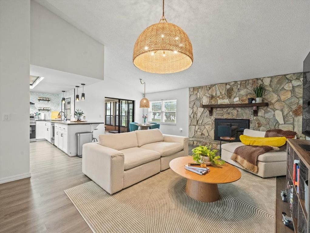 Fireplace, Interior, Kitchen, Living room, Pendant Lights, Stone Walls, Wood Texture Flooring