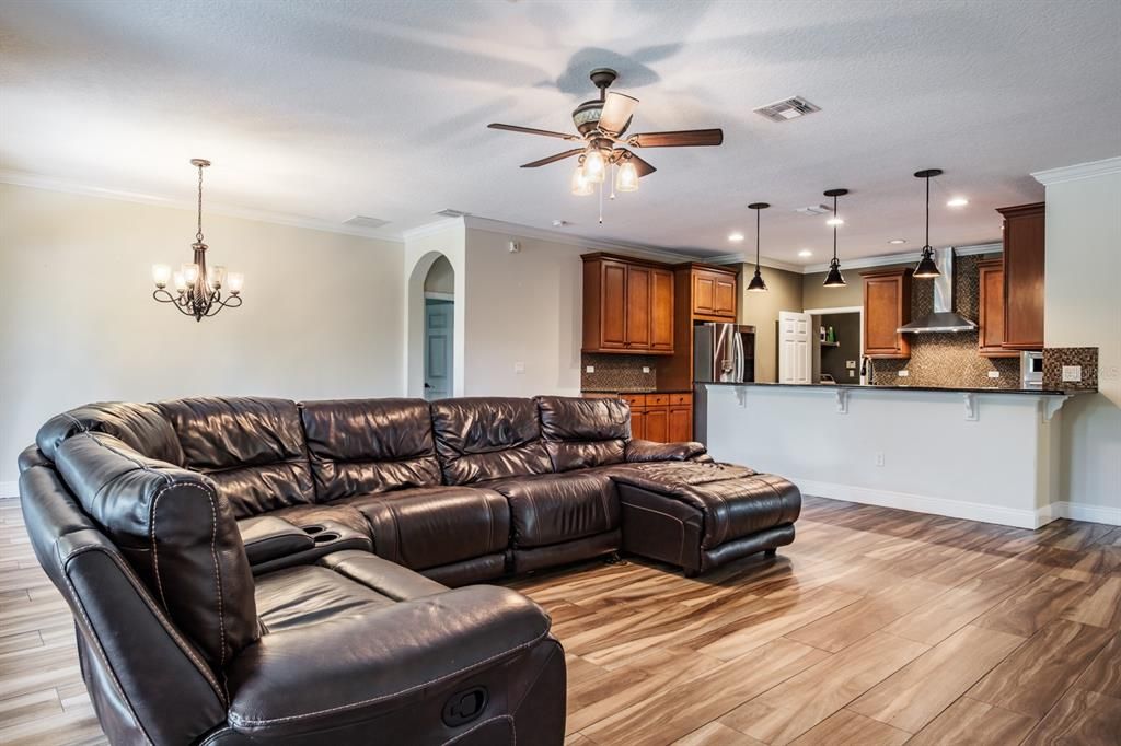 Chandelier, Home Theatre Room, Interior, Kitchen, Living room, Pendant Lights, Recessed Lighting, Wood Texture Flooring