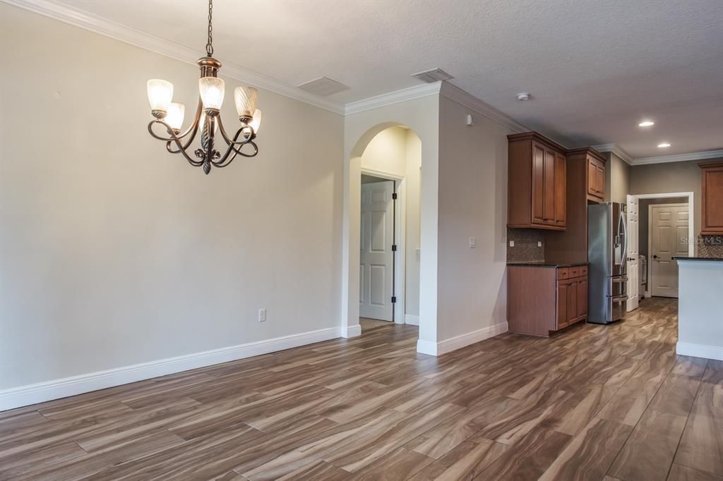 Chandelier, Empty room, Interior, Kitchen, Recessed Lighting, Wood Texture Flooring