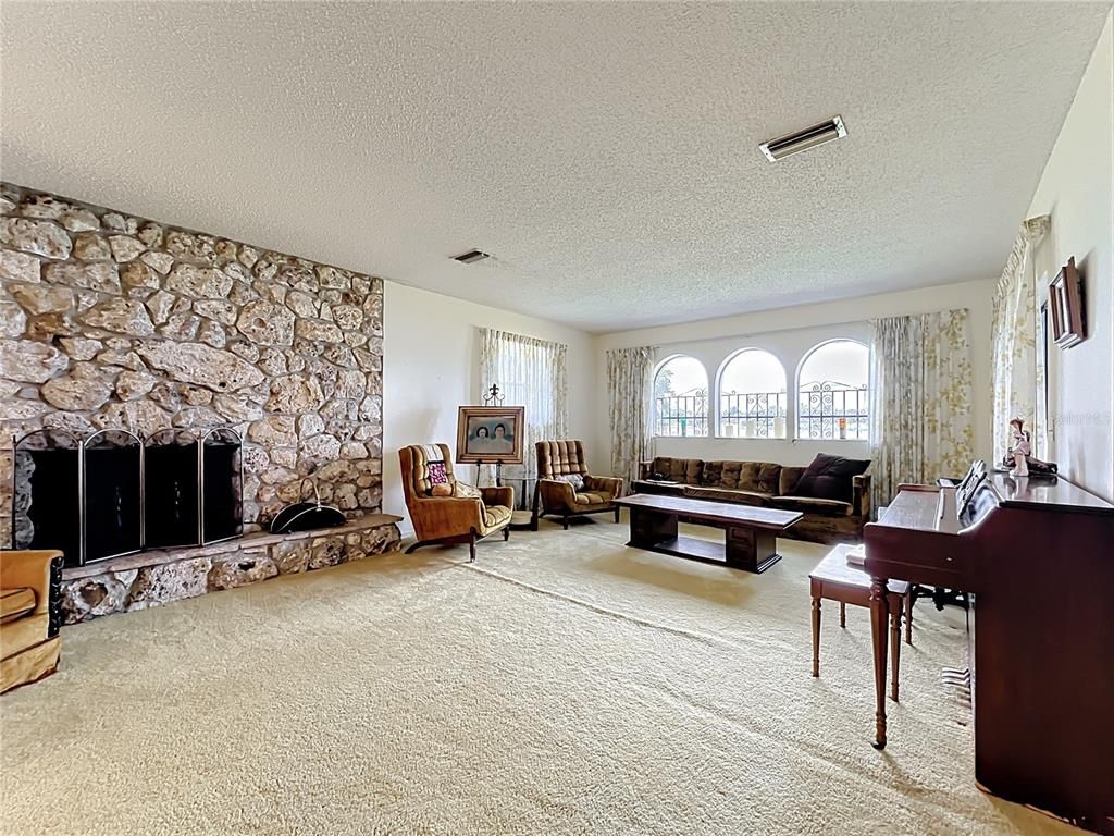 Fireplace, Interior, Living room, Piano, Stone Walls
