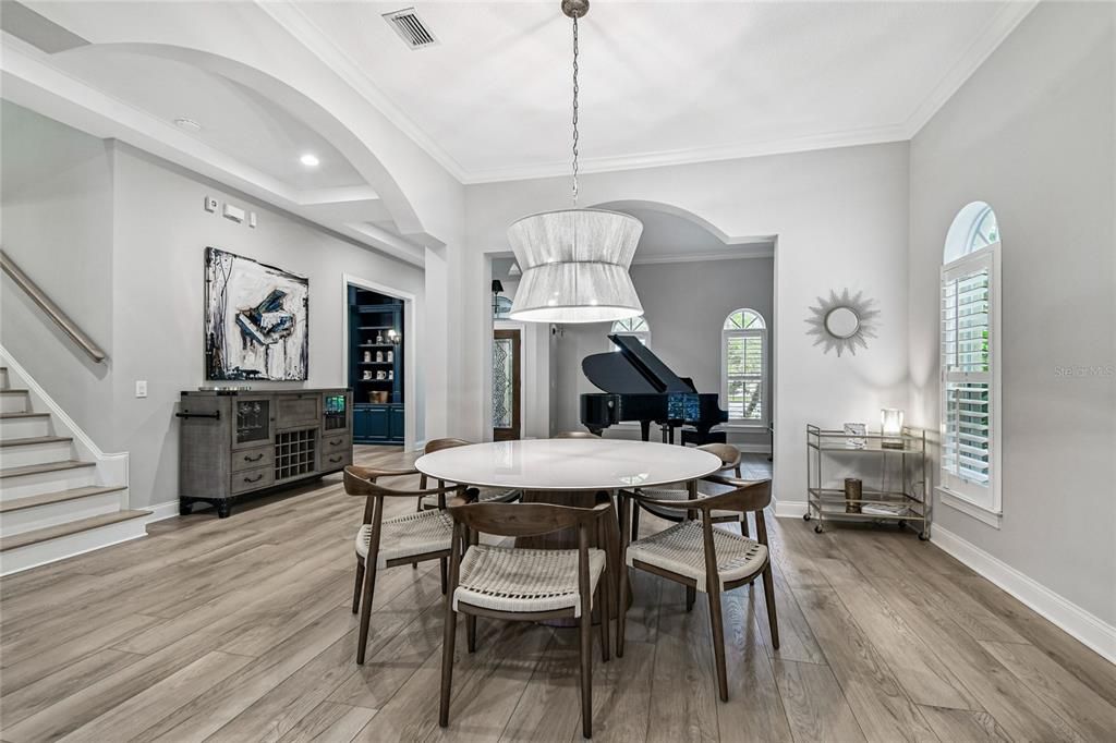 Dining room, Interior, Pendant Lights, Piano, Recessed Lighting, Wood Texture Flooring