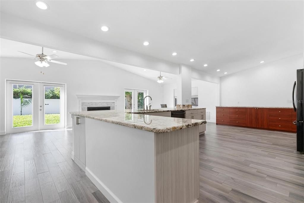 Fireplace, Interior, Kitchen, Pendant Lights, Recessed Lighting, Wood Texture Flooring