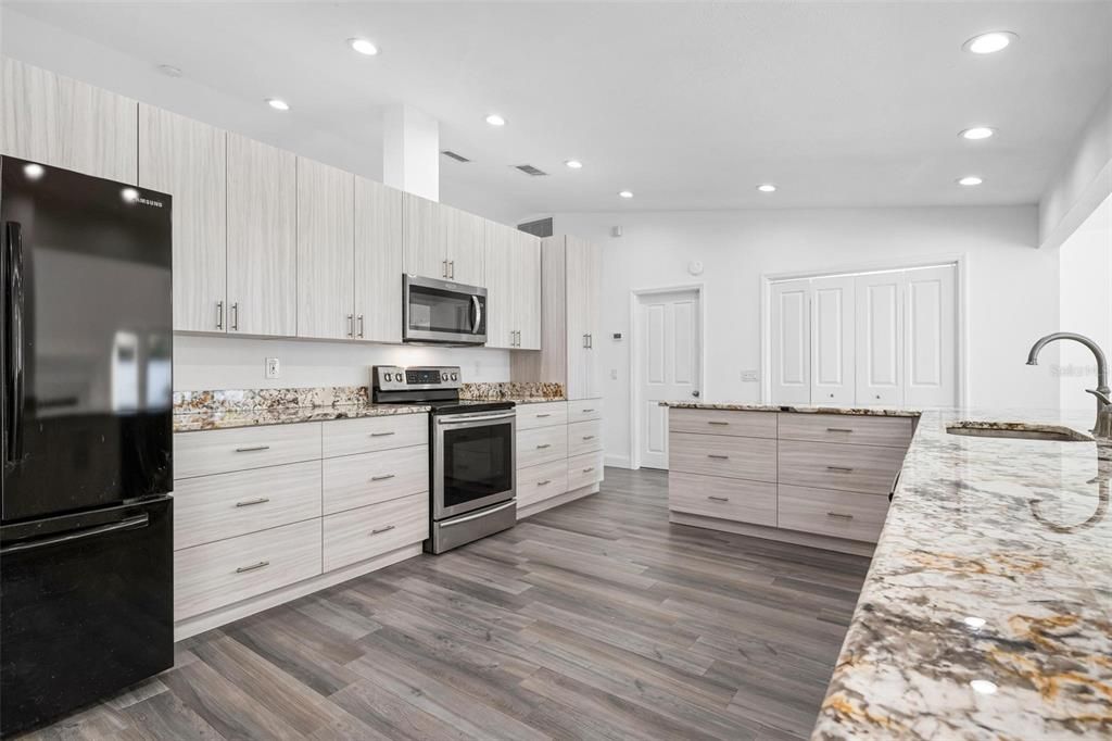 Interior, Kitchen, Recessed Lighting, Stainless Steel Appliances, Wood Texture Flooring