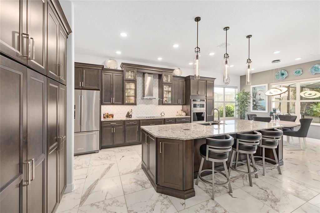 Dining room, Interior, Kitchen, Marble, Pendant Lights, Recessed Lighting, Stainless Steel Appliances