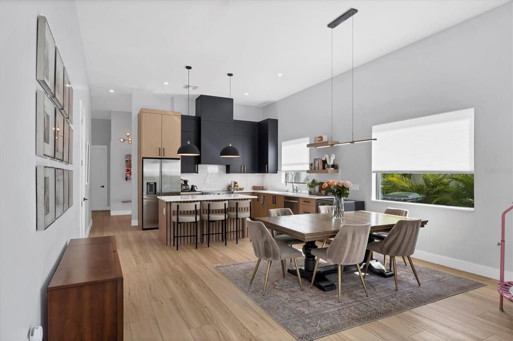 Dining room, Interior, Kitchen, Pendant Lights, Recessed Lighting, Stainless Steel Appliances, Wood Texture Flooring