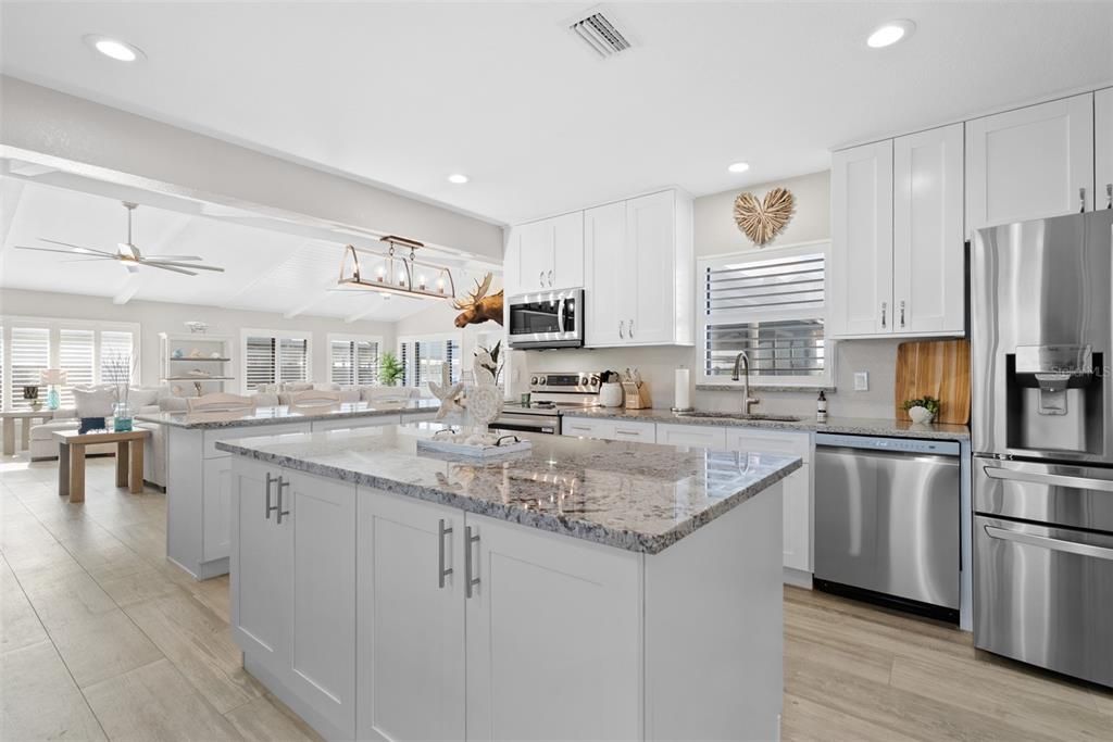 Dining room, Interior, Kitchen, Recessed Lighting, Stainless Steel Appliances, Wood Texture Flooring
