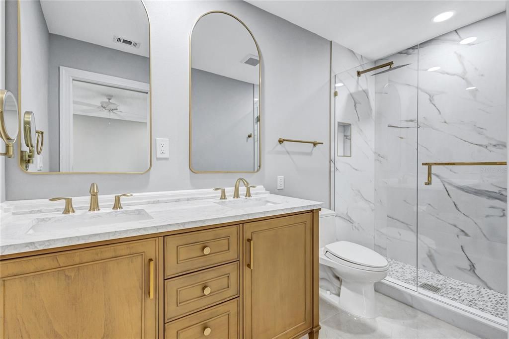 Bathroom, Dual Sink Vanities, Glass Shower, Interior, Marble Walls, Recessed Lighting