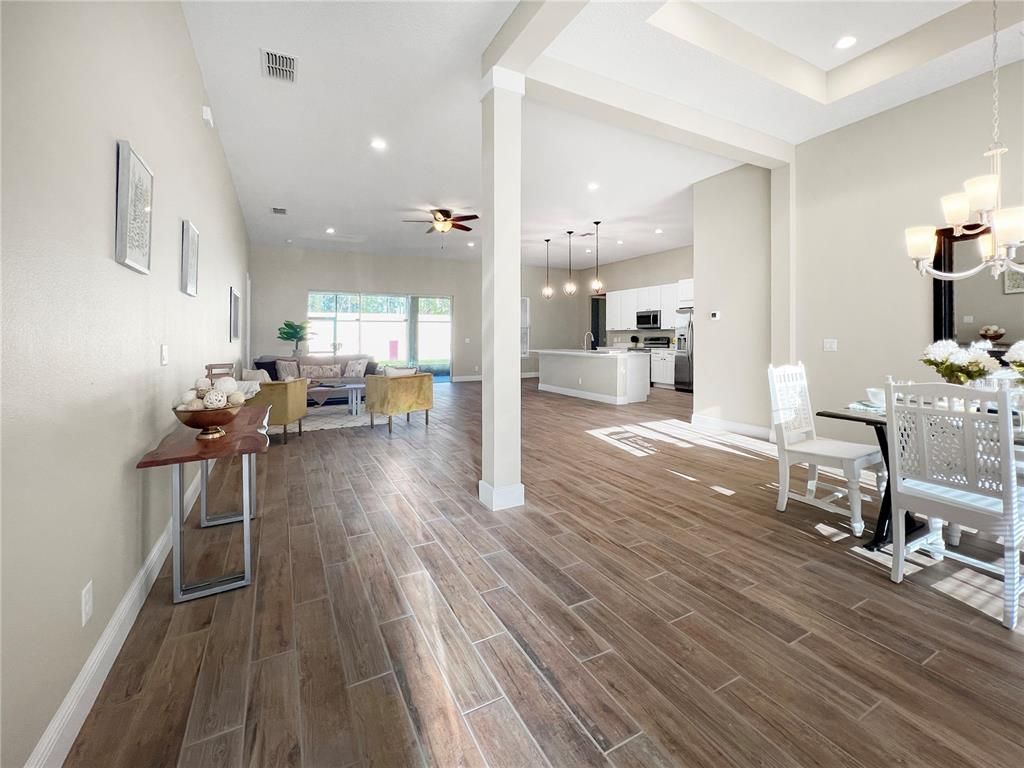 Dining room, Interior, Kitchen, Living room, Pendant Lights, Recessed Lighting, Stainless Steel Appliances, Wood Texture Flooring
