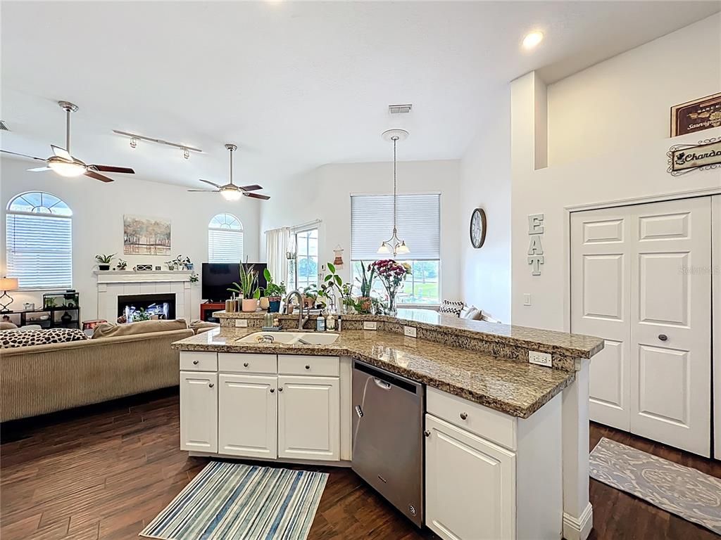Fireplace, Interior, Kitchen, Living room, Pendant Lights, Recessed Lighting, Wood Texture Flooring